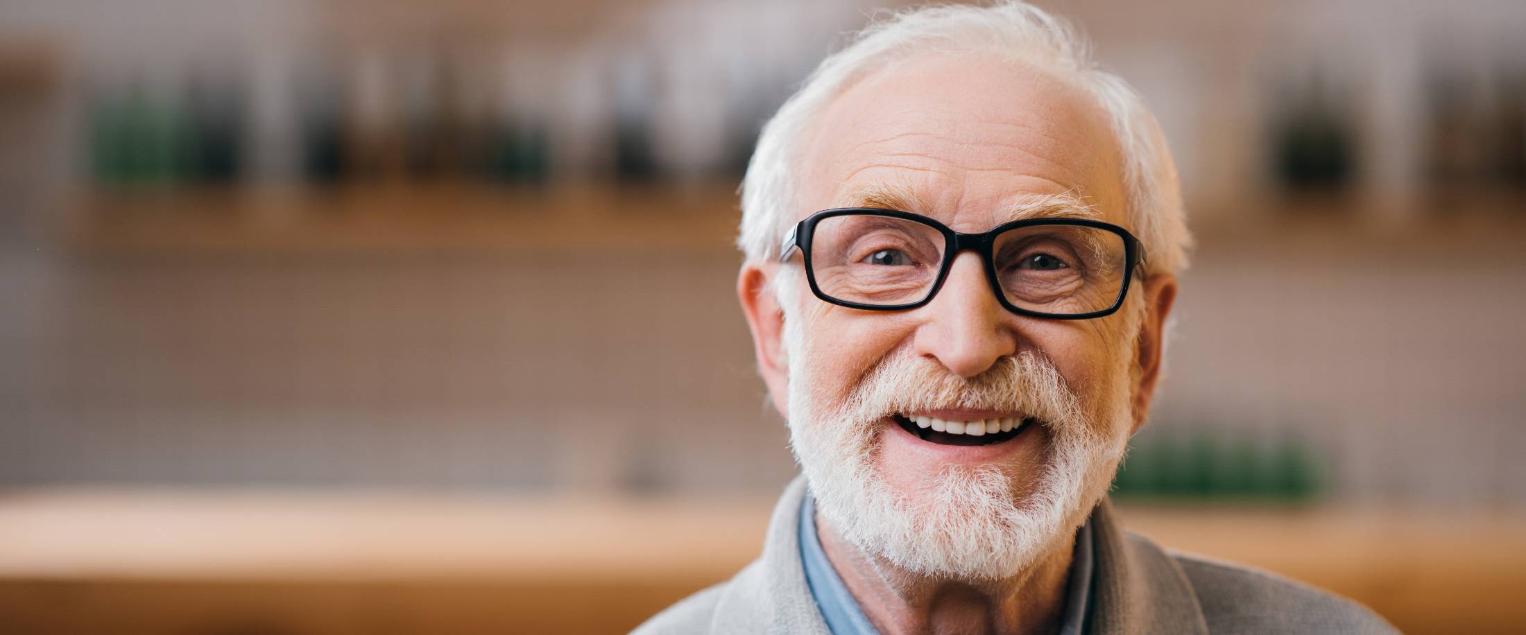 happy senior man smiling at the camera