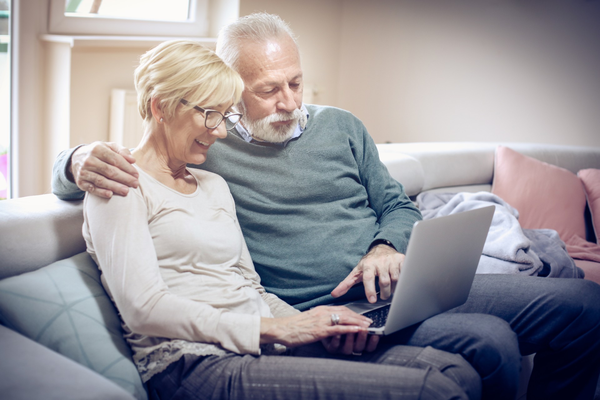 Senior couple using a laptop together