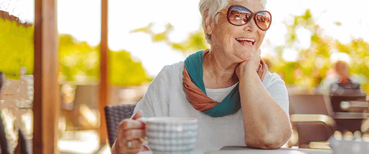 Senior woman enjoying time outside her senior living community