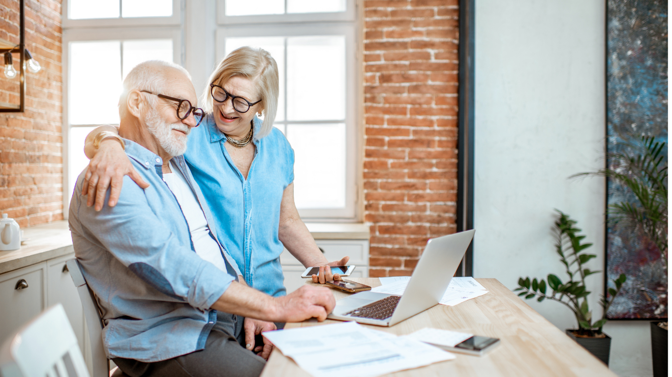 Blog Images – 2025-07-28T140526.734 A senior couple happily sorting their finances